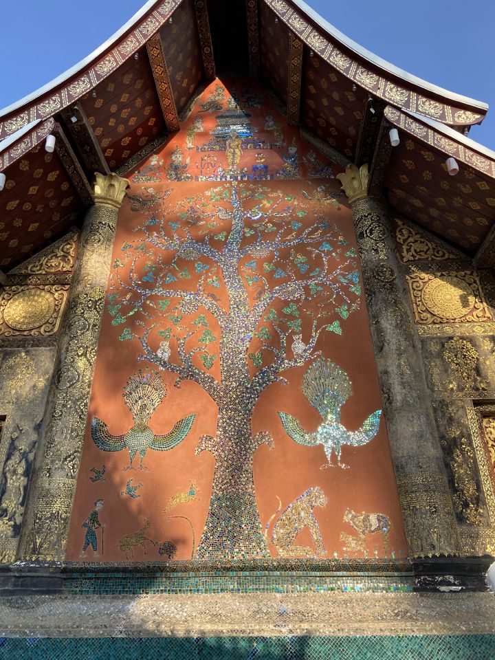 The glass-mosaic phoenix at Wat Xieng Thong, Luang Prabang laos